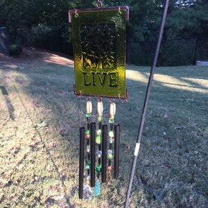Glass Live sign with wind chimes